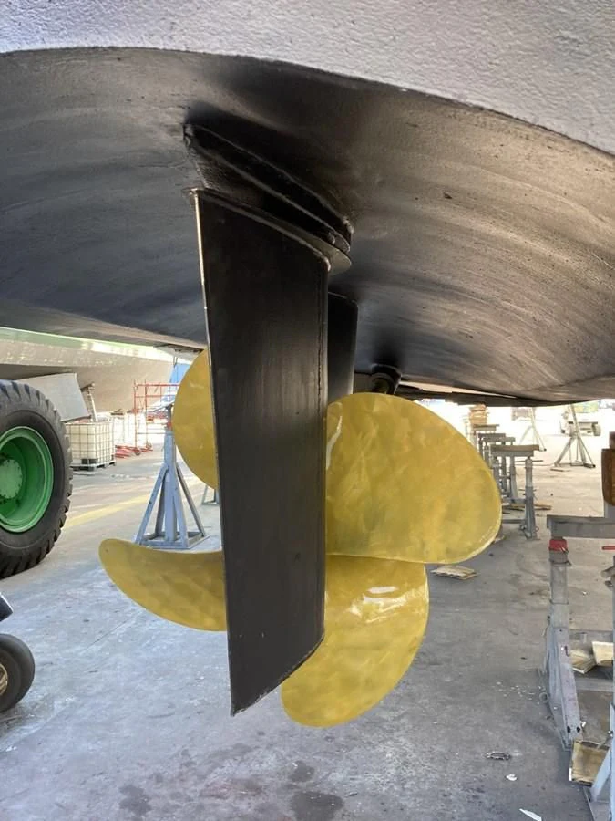 a large yellow and black machine aboard ENTOURAGE Yacht for Sale