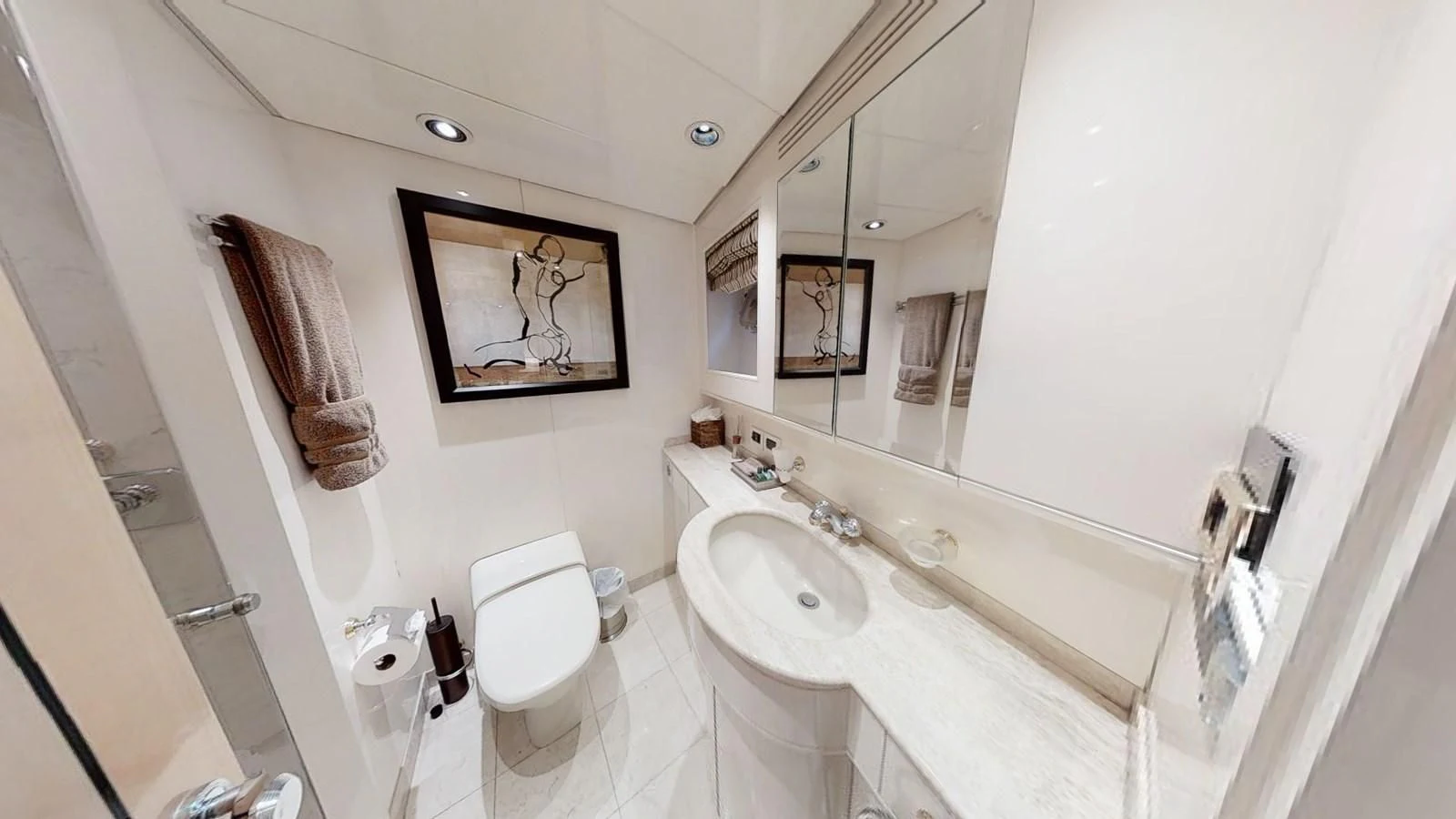 a bathroom with a bathtub sink and toilet aboard ENTOURAGE Yacht for Sale