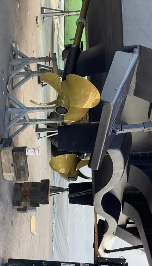 a machine with a large yellow object on the side aboard ENTOURAGE Yacht for Sale