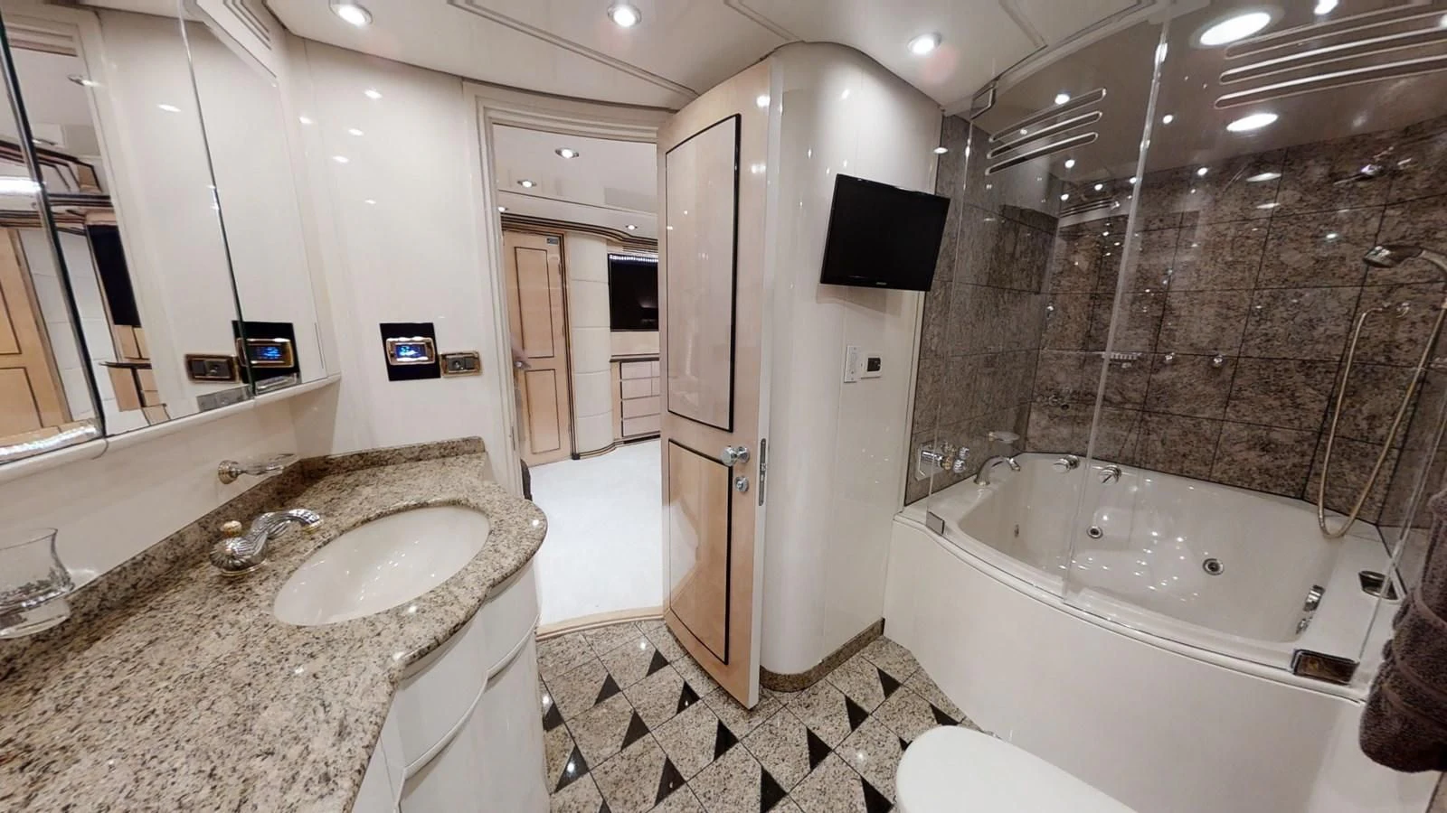 a bathroom with a marble counter top aboard ENTOURAGE Yacht for Sale