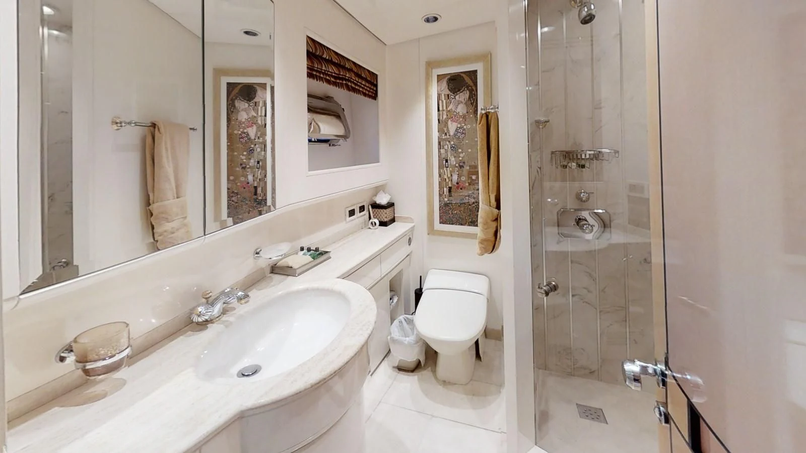 a bathroom with a sink toilet and a shower aboard ENTOURAGE Yacht for Sale