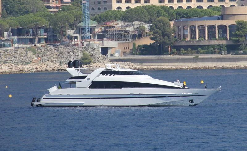 a white boat in the water aboard ENTOURAGE Yacht for Sale