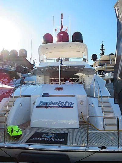 a large white boat with a red domed roof and a blue sky aboard ENTOURAGE Yacht for Sale