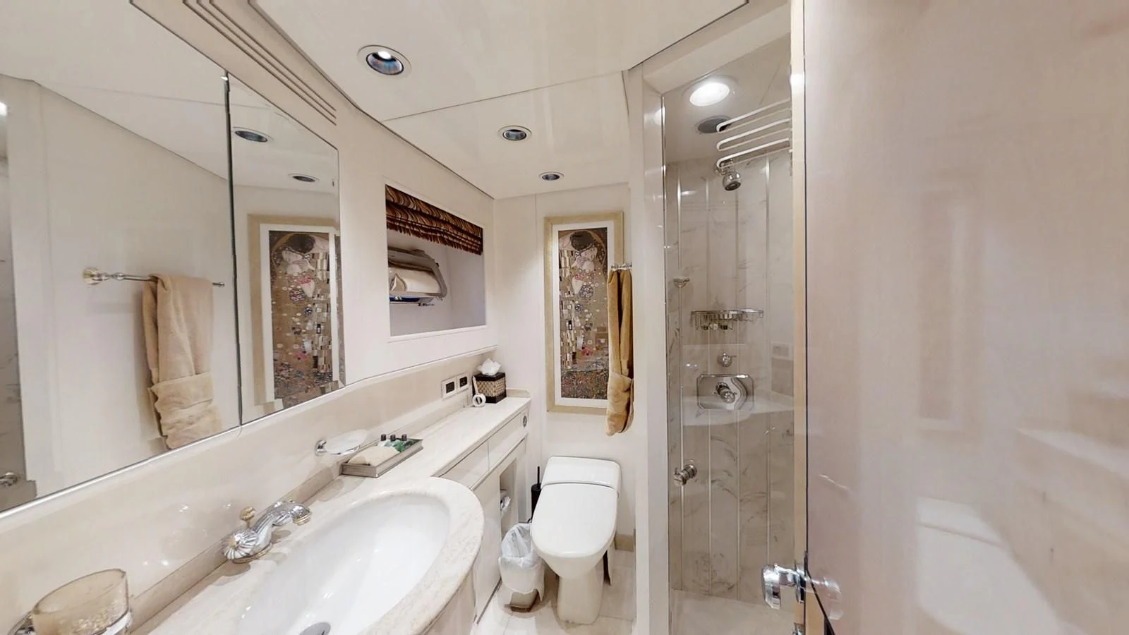 a bathroom with a shower sink and toilet aboard ENTOURAGE Yacht for Sale