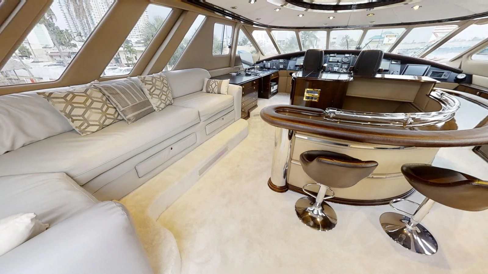 a room with a table and a couch aboard ENTOURAGE Yacht for Sale