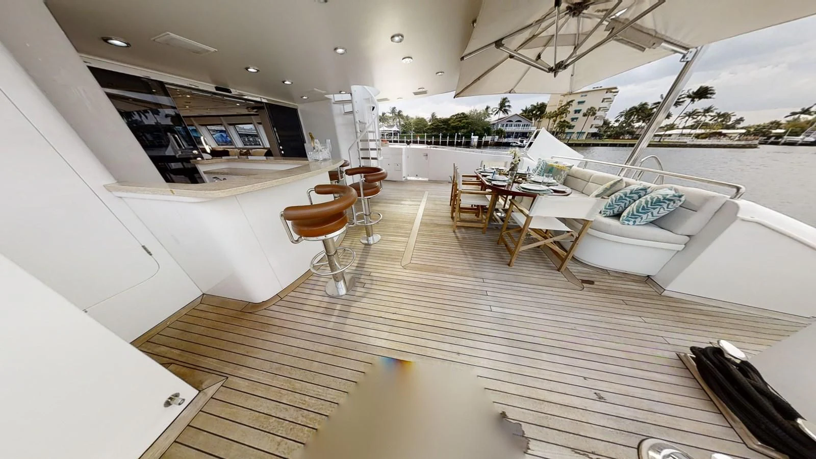 a room with a couch and chairs aboard ENTOURAGE Yacht for Sale
