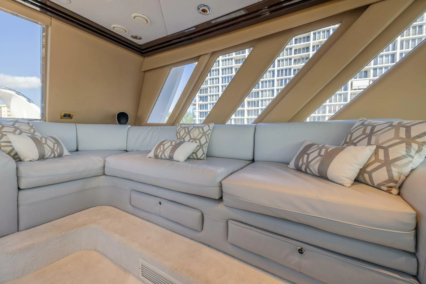 a couch in a room aboard ENTOURAGE Yacht for Sale