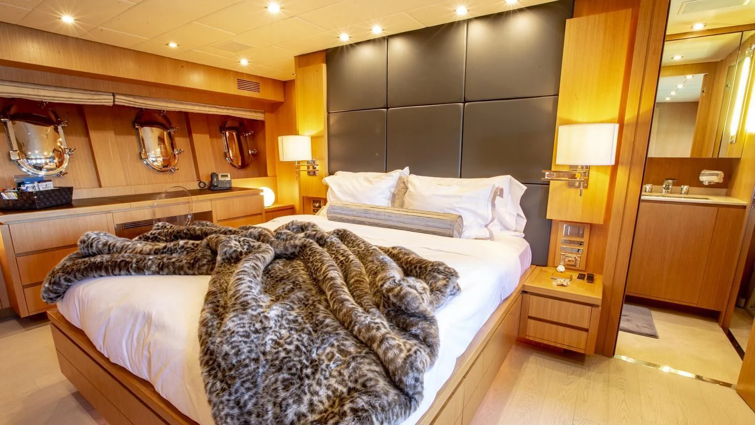 a large bed in a room aboard VELOCE Yacht for Sale