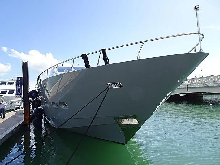 a boat docked at a pier aboard VELOCE Yacht for Sale