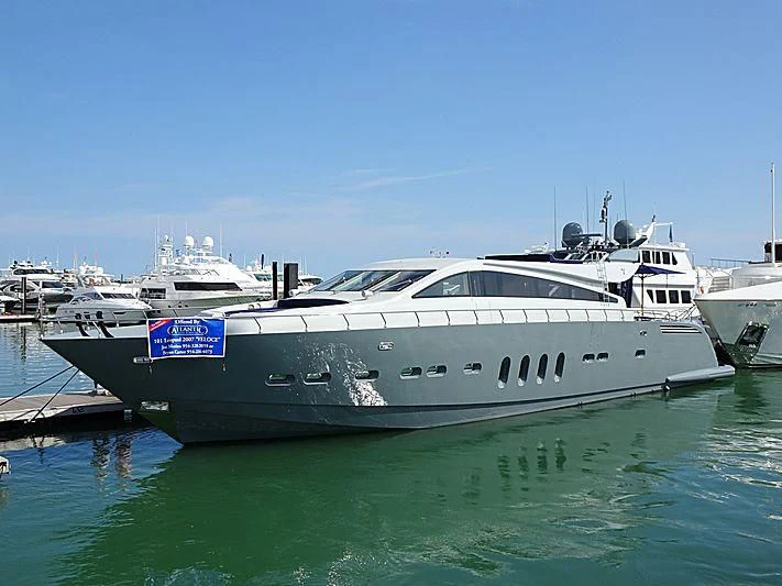 a boat docked at a pier aboard VELOCE Yacht for Sale