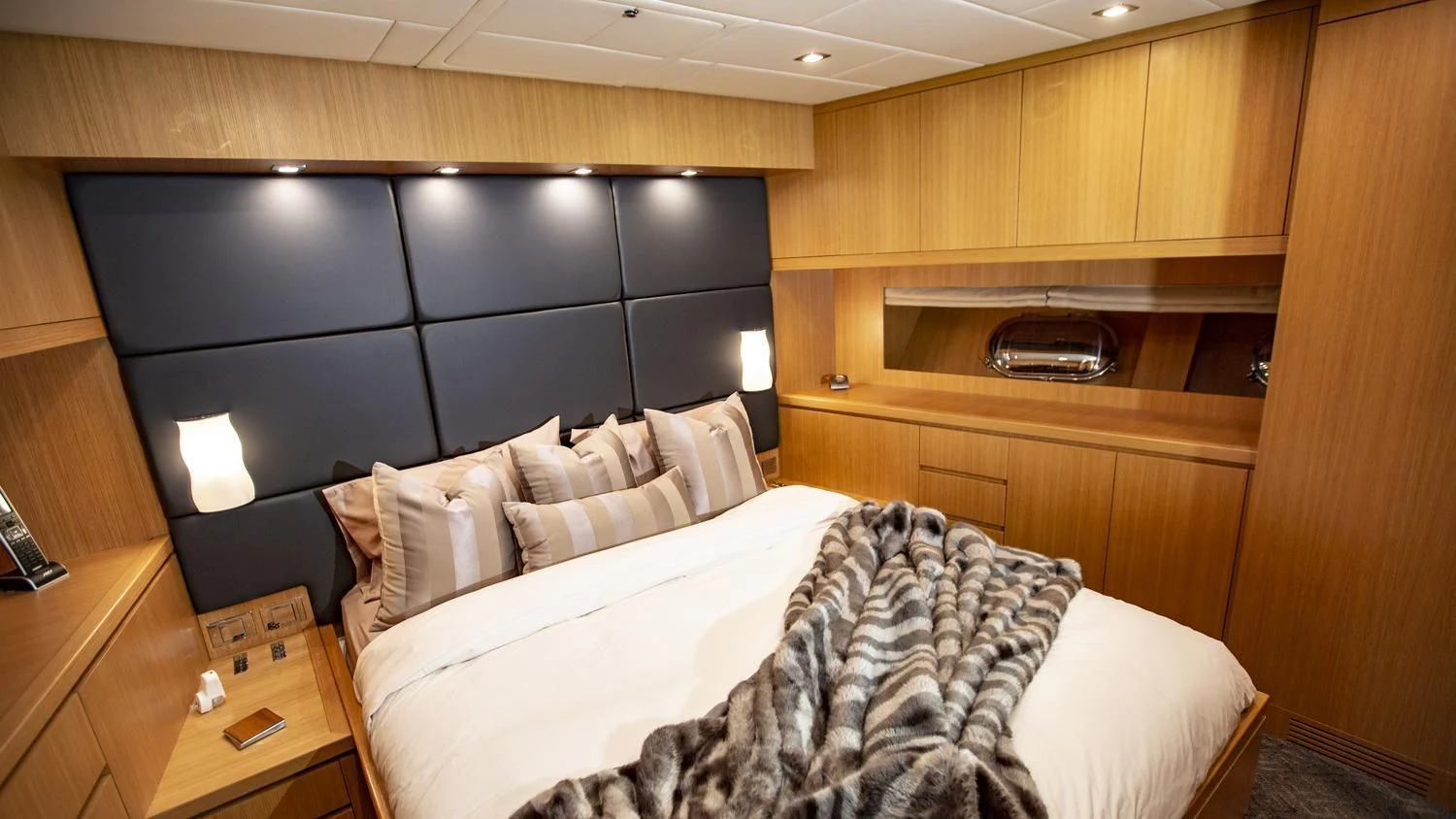 a bed in a room aboard VELOCE Yacht for Sale