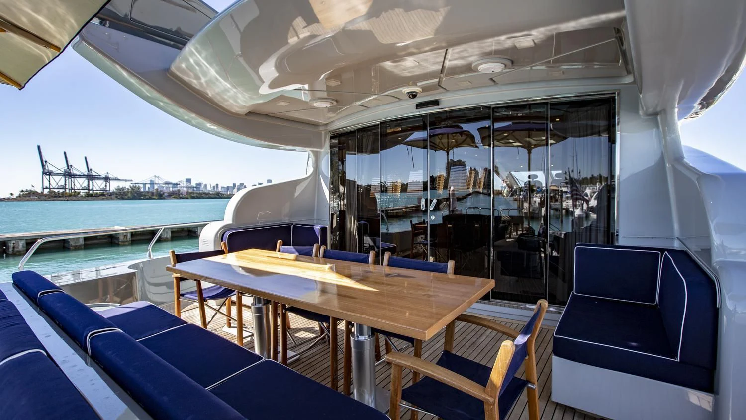a boat with tables and chairs aboard VELOCE Yacht for Sale