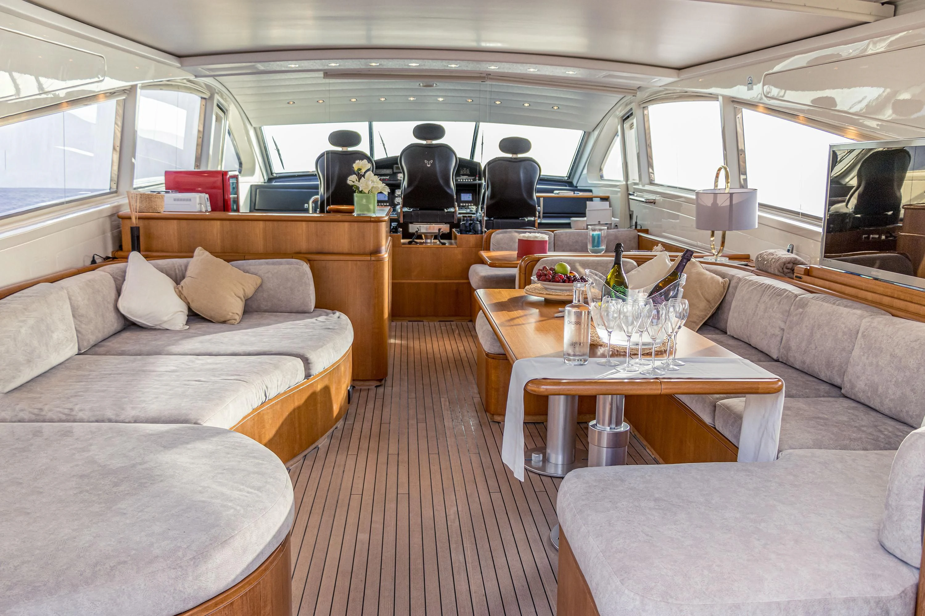 a room with a bed and a table aboard VELOCE Yacht for Sale