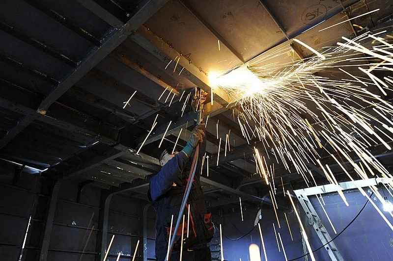 a person working in a building aboard REALE PACIFICO 32#1 Yacht for Sale