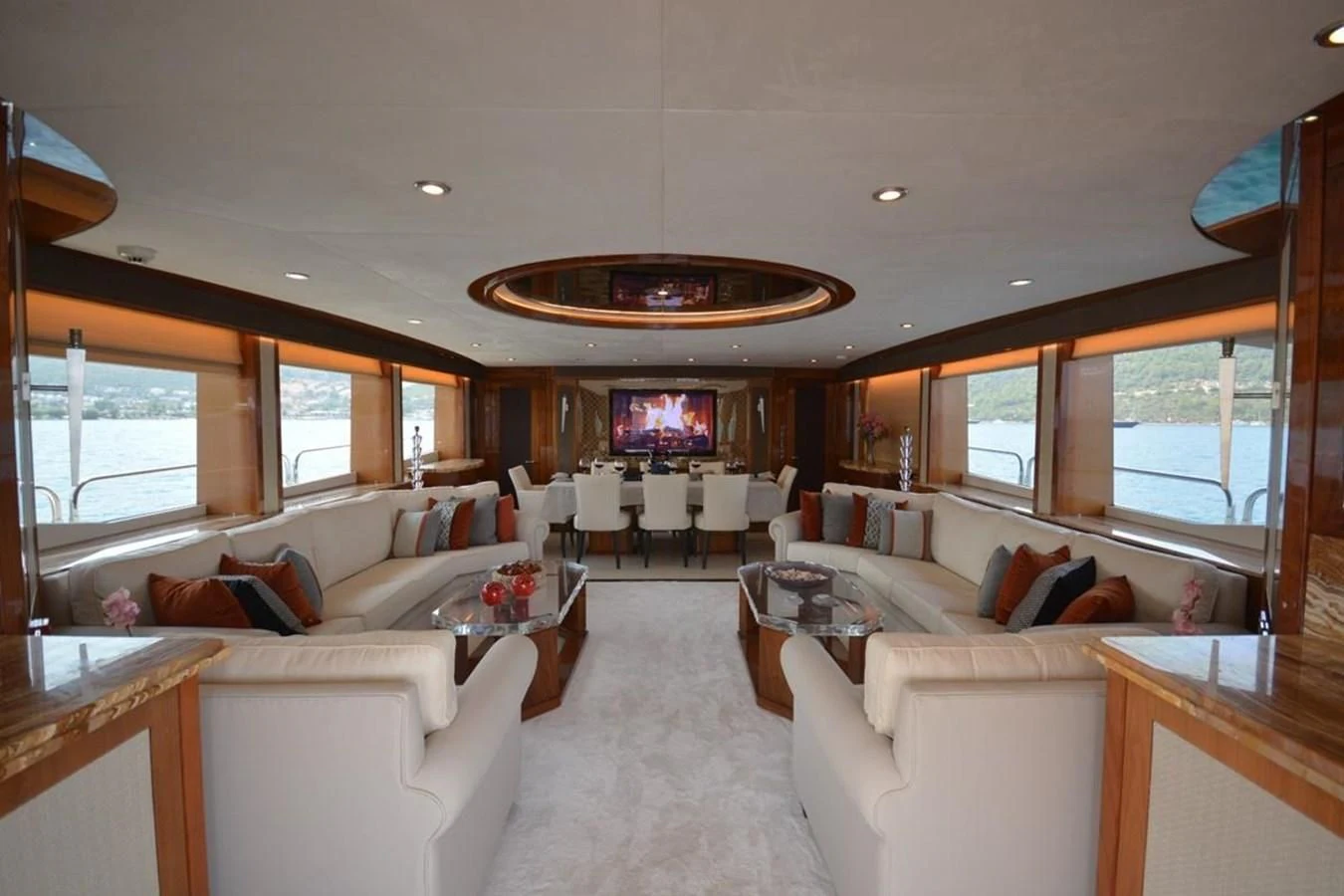 a living room with a large window aboard SUNSEEKER 34M Yacht for Sale