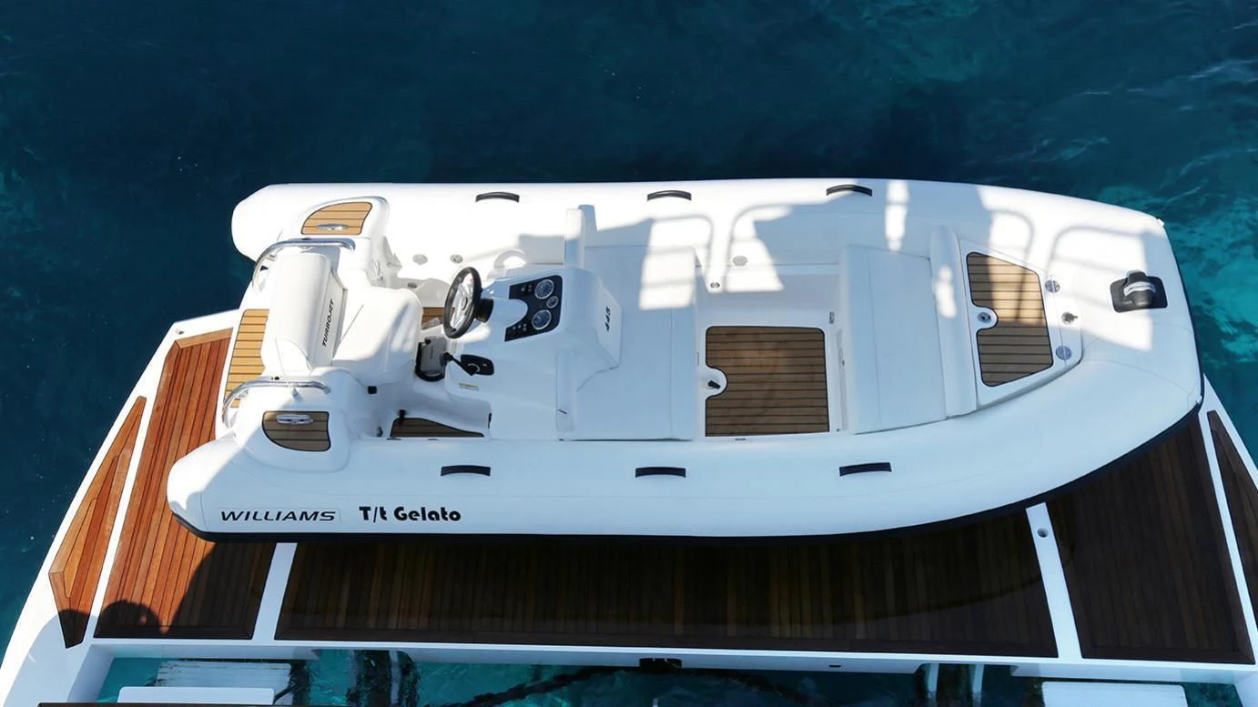 a white and orange space ship aboard GELATO Yacht for Sale