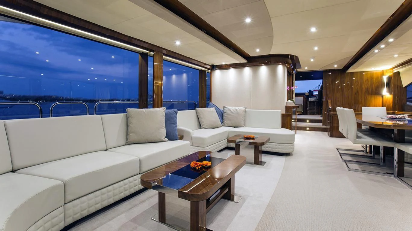 a living room with a large window aboard GELATO Yacht for Sale