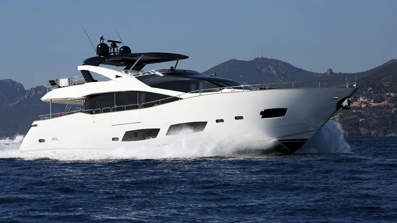 a white yacht in the water aboard GELATO Yacht for Sale