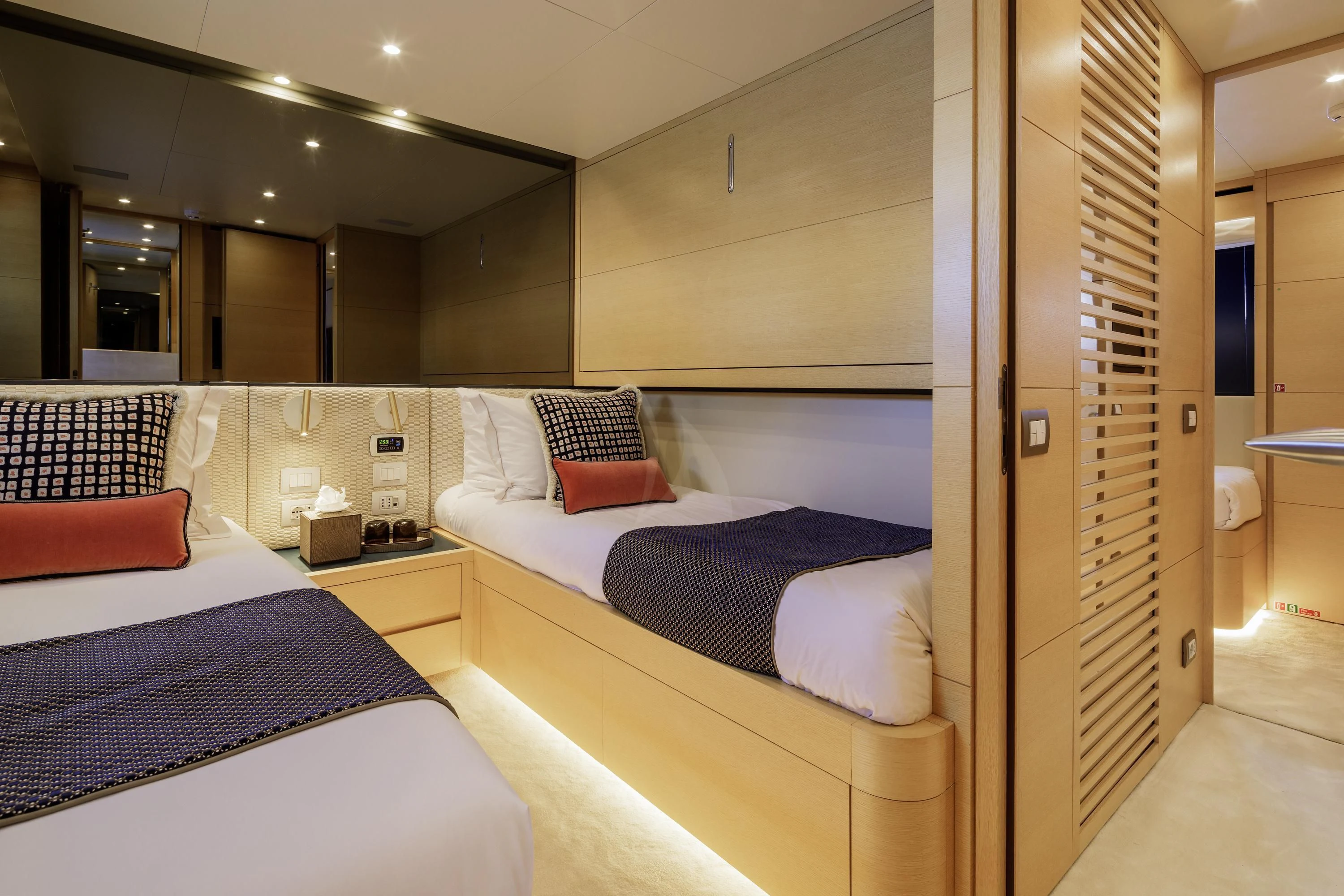 a room with two beds aboard ELYSIUM Yacht for Sale