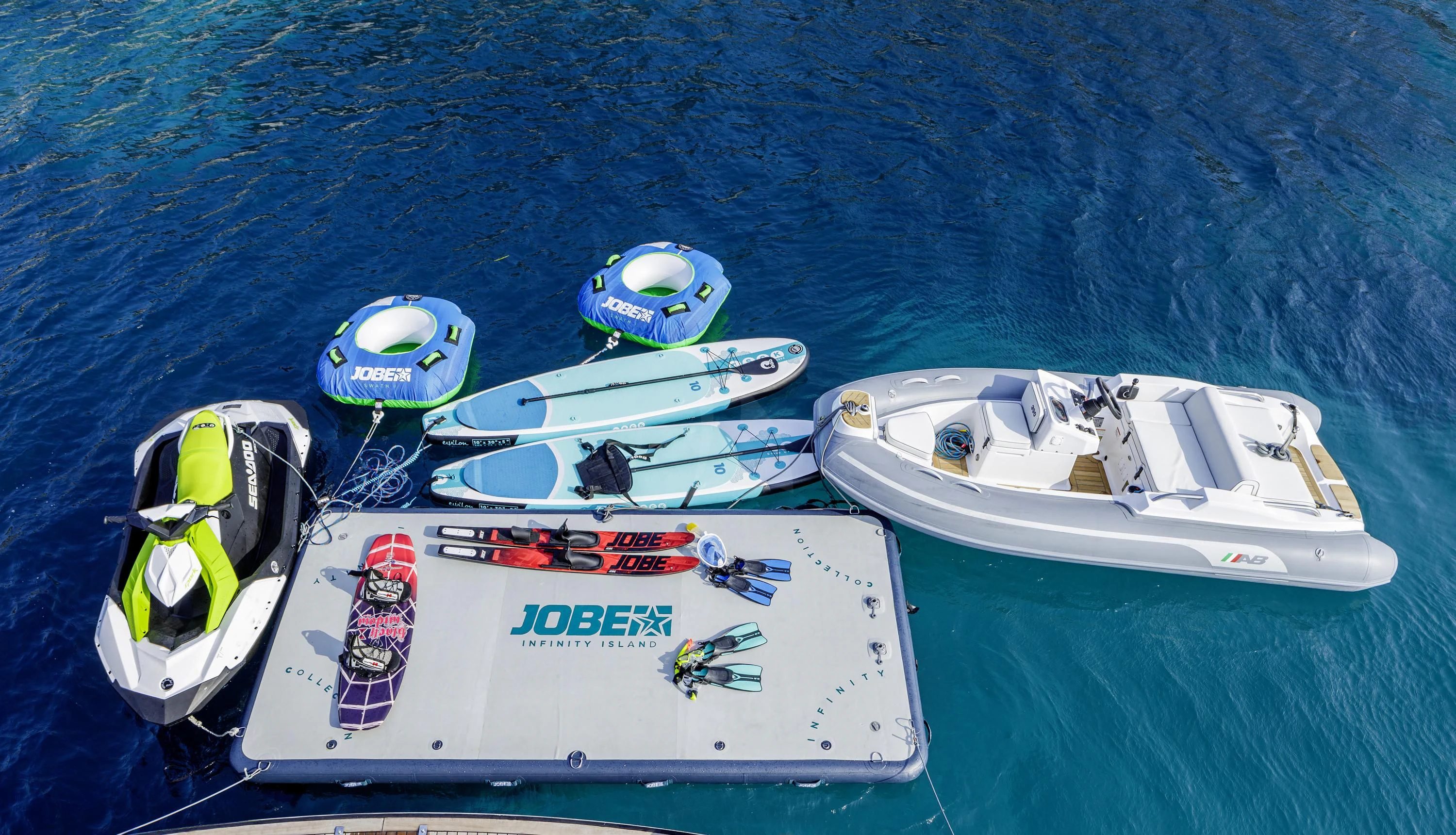 a couple of boats on the water aboard ELYSIUM Yacht for Sale