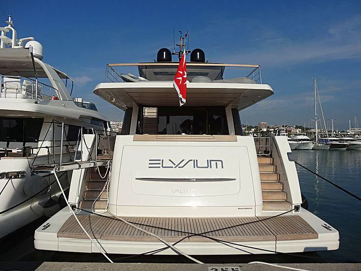 a boat docked at a pier aboard ELYSIUM Yacht for Sale