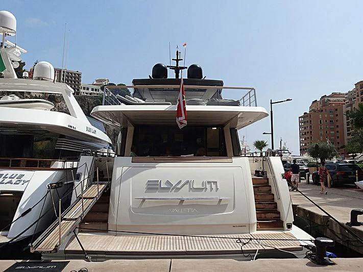 a boat on a dock aboard ELYSIUM Yacht for Sale