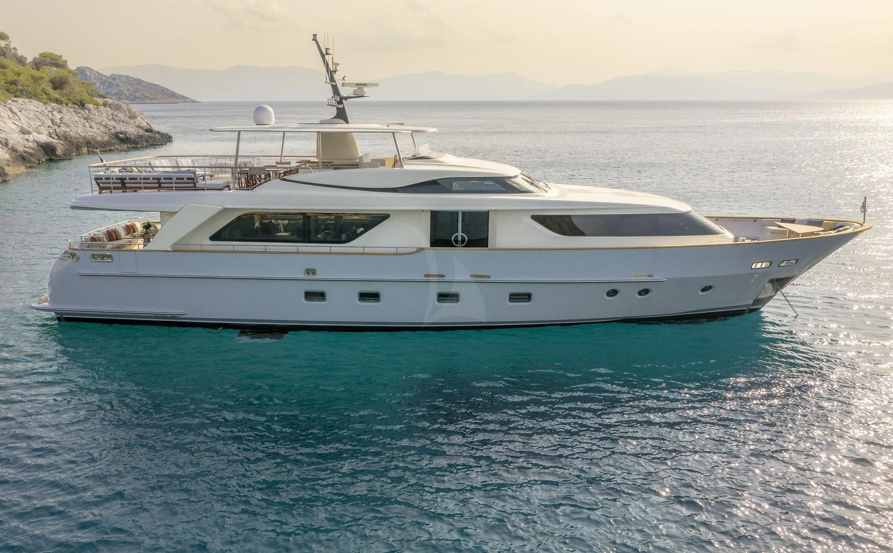 a white yacht in the water aboard ELYSIUM Yacht for Sale