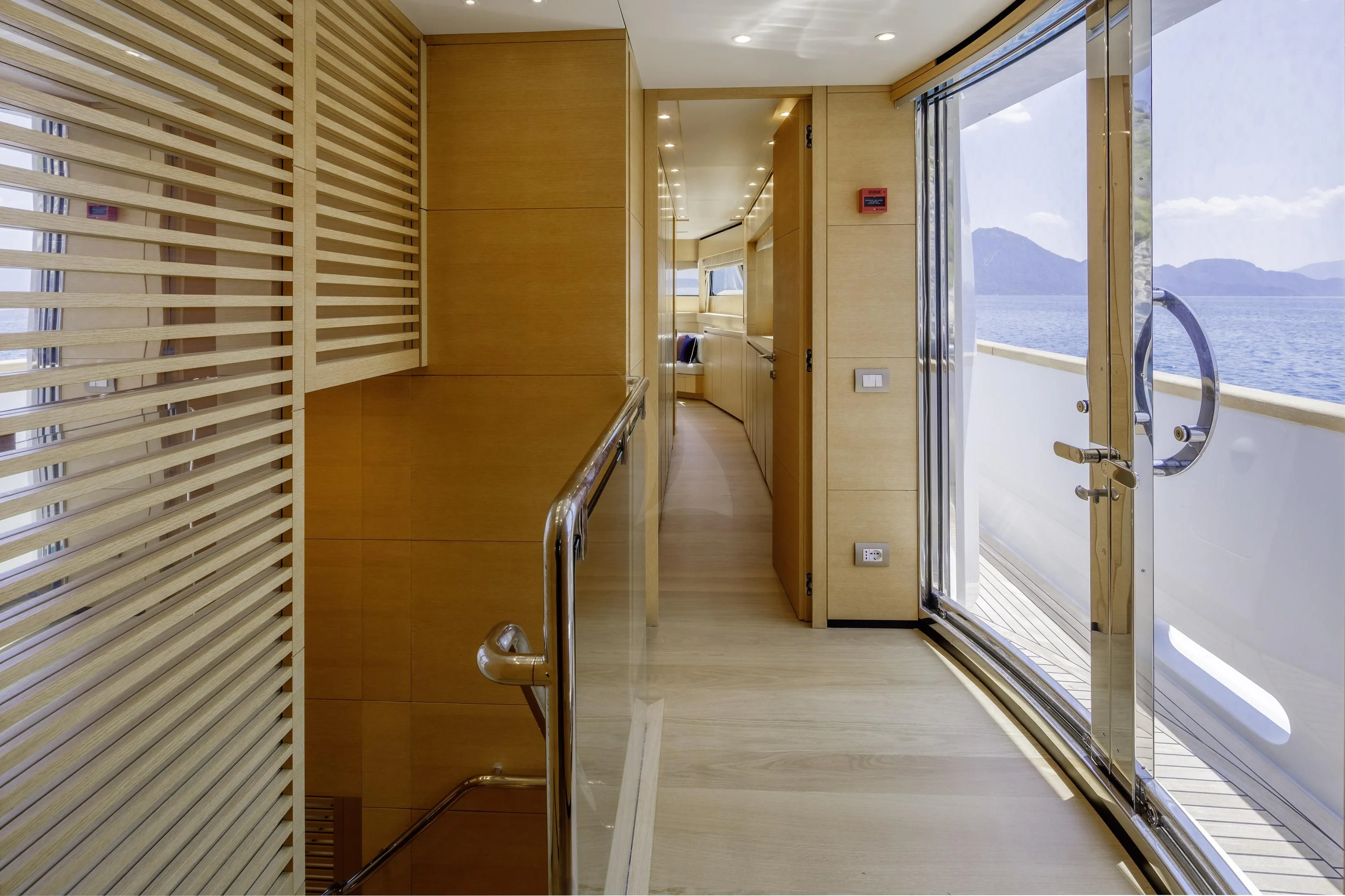 a hallway with doors aboard ELYSIUM Yacht for Sale