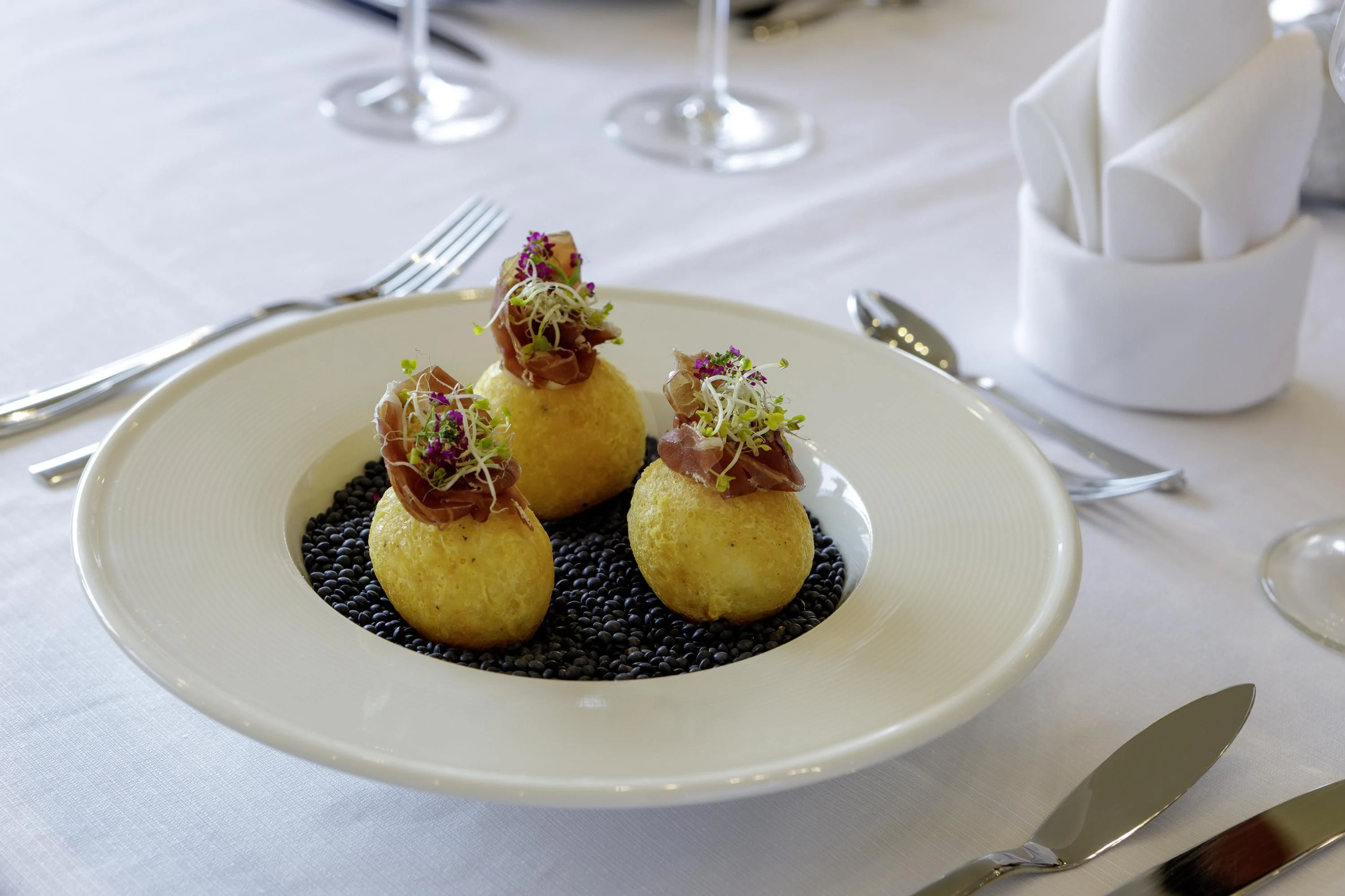 a plate of desserts aboard ELYSIUM Yacht for Sale