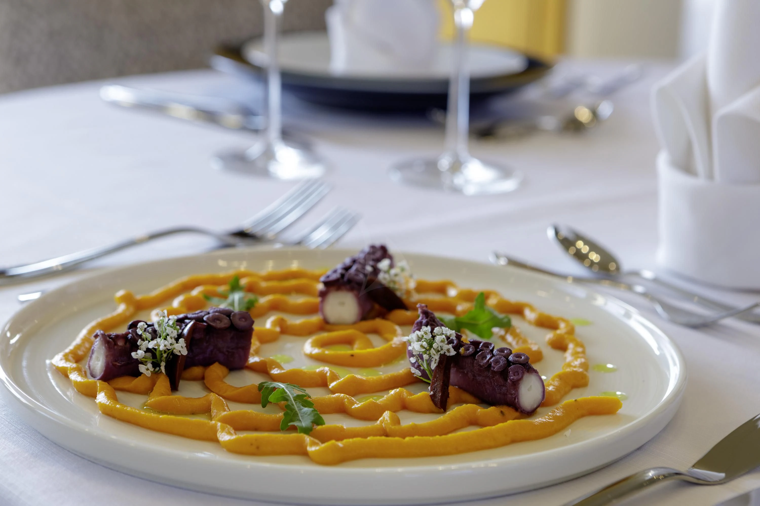 a plate of food aboard ELYSIUM Yacht for Sale
