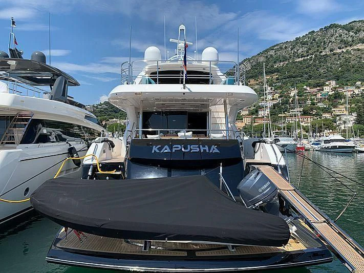 boats docked at a pier aboard KAPUSHA Yacht for Sale