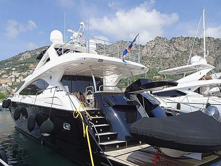a group of boats are parked in a harbor aboard KAPUSHA Yacht for Sale
