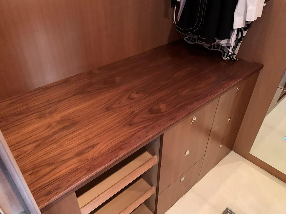 a wooden shelf with a white towel aboard KAPUSHA Yacht for Sale