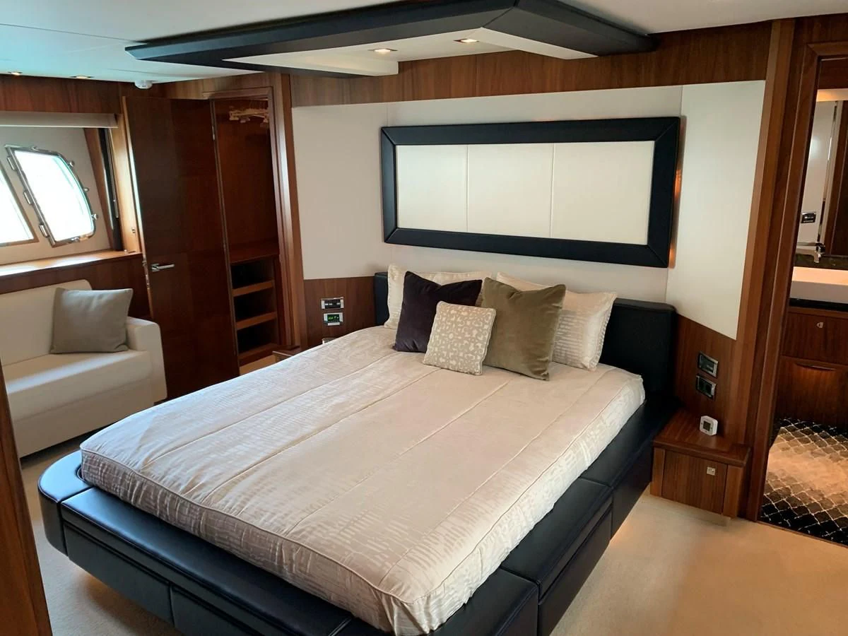 a bed in a room aboard KAPUSHA Yacht for Sale