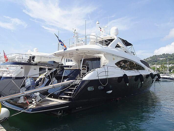a large white boat in the water aboard KAPUSHA Yacht for Sale