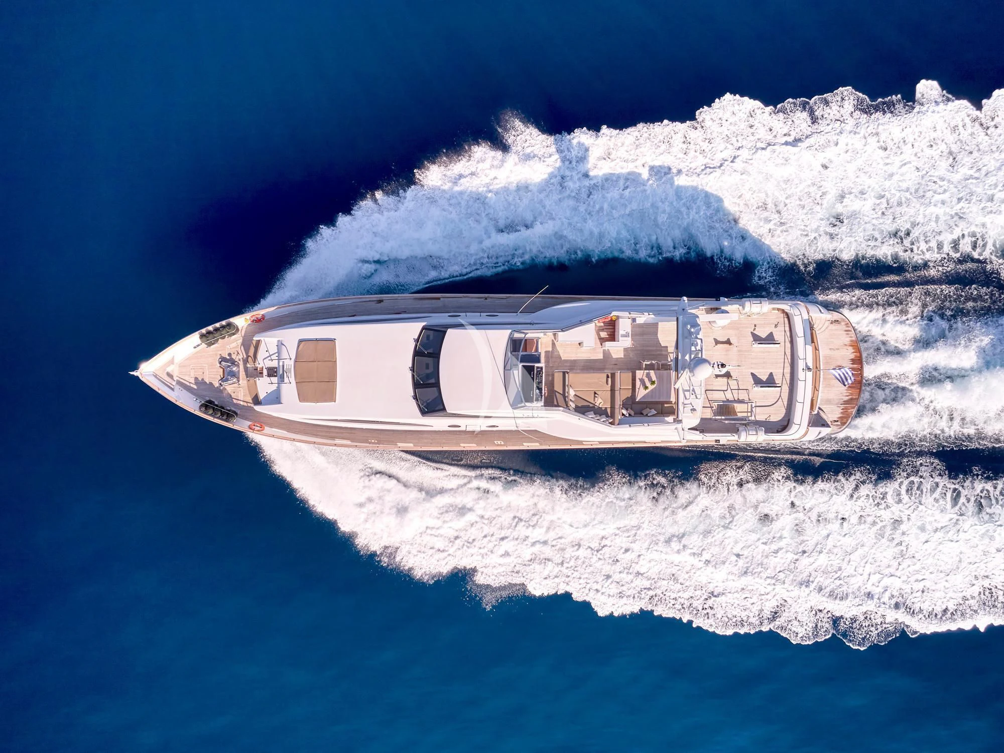 a satellite in space above the clouds aboard HELIOS Yacht for Charter