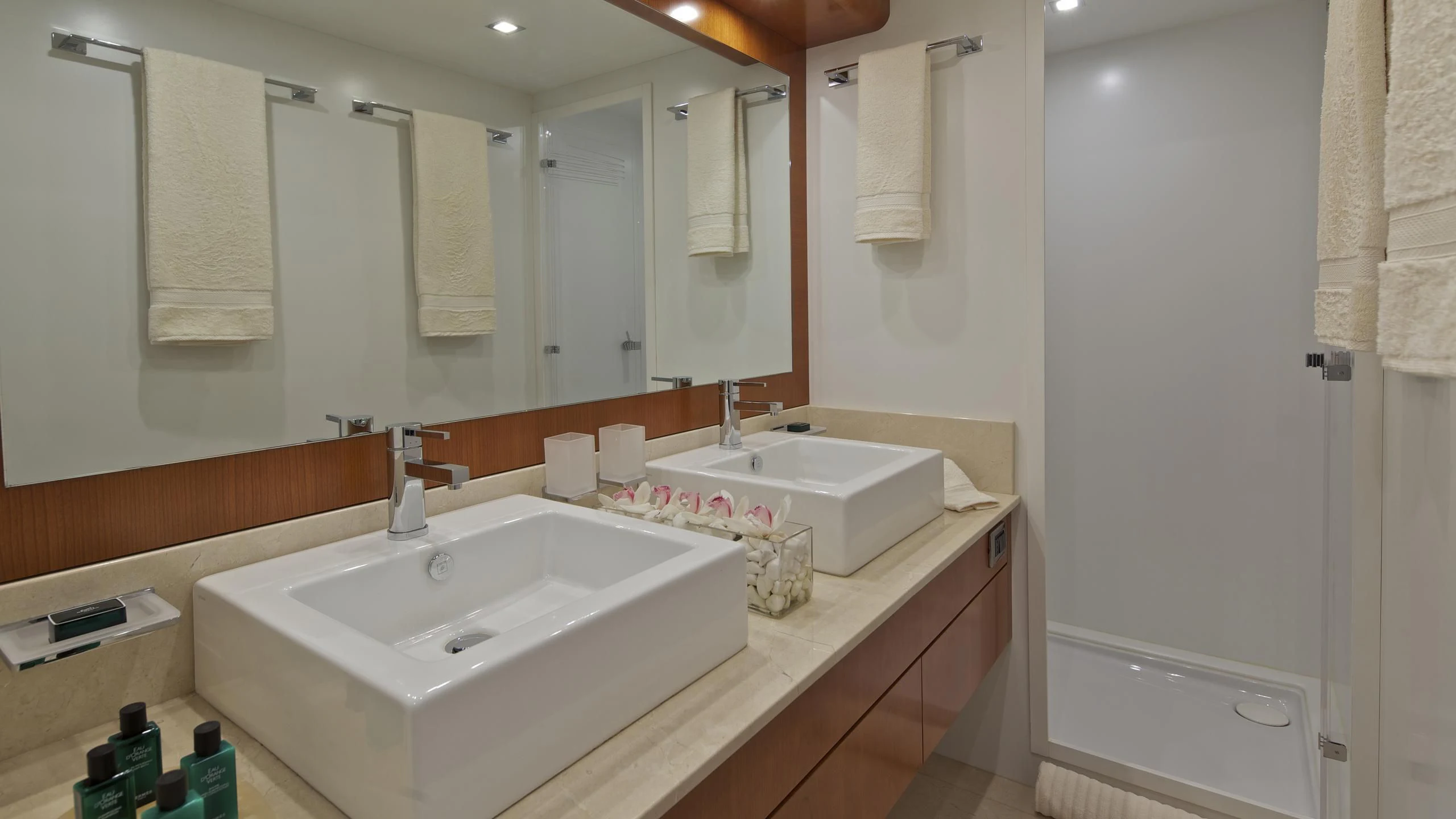 a bathroom with two sinks aboard HELIOS Yacht for Charter
