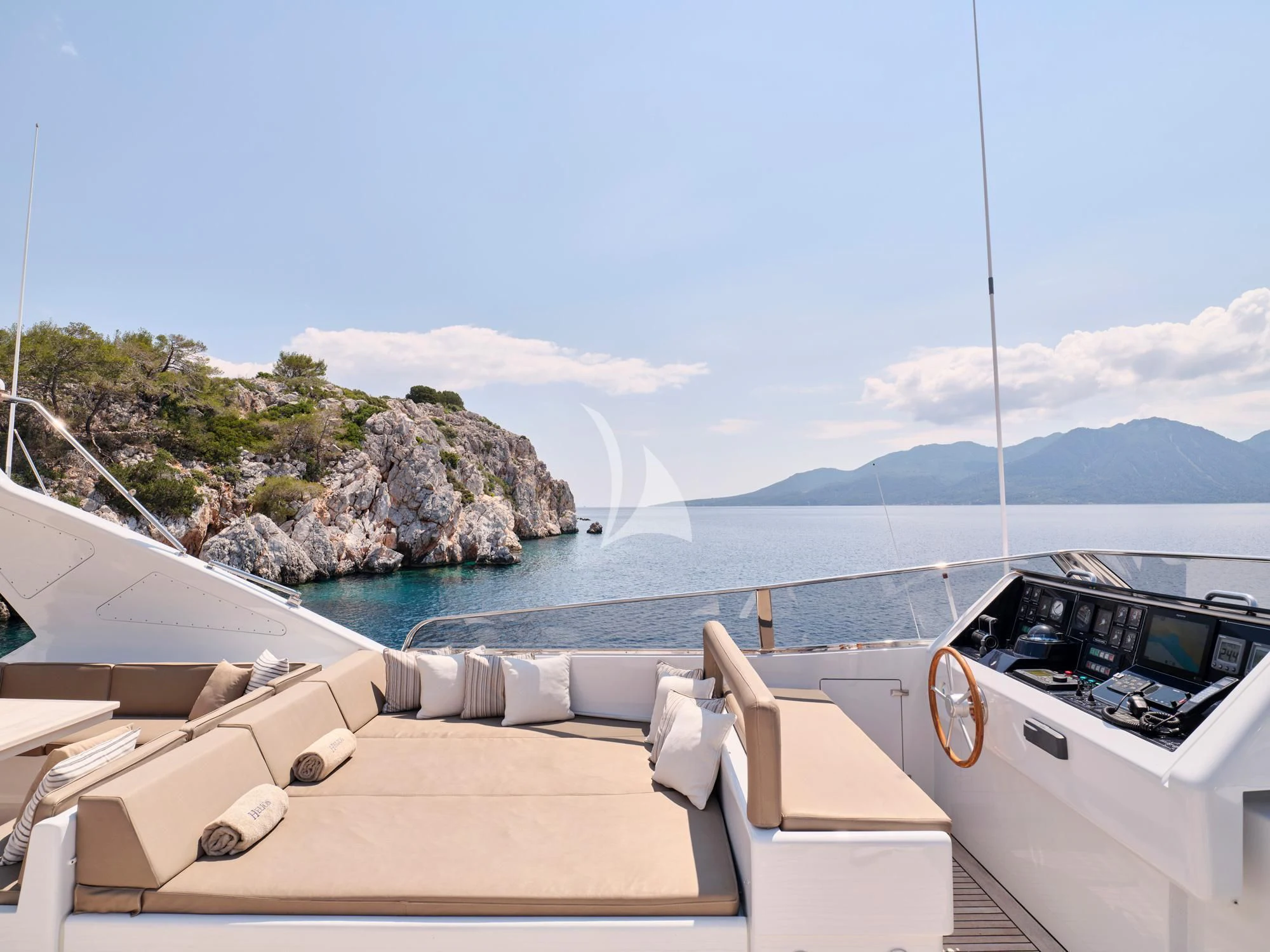 a boat on the water aboard HELIOS Yacht for Charter