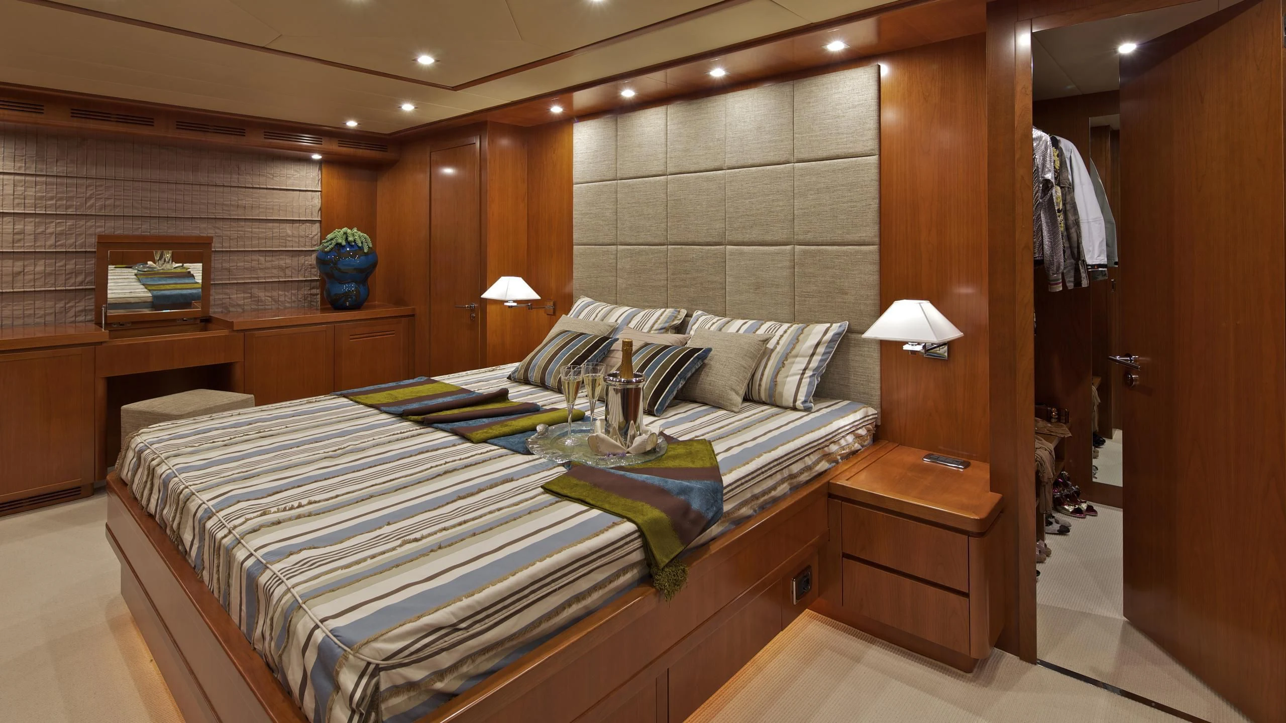 a bed in a room aboard HELIOS Yacht for Charter