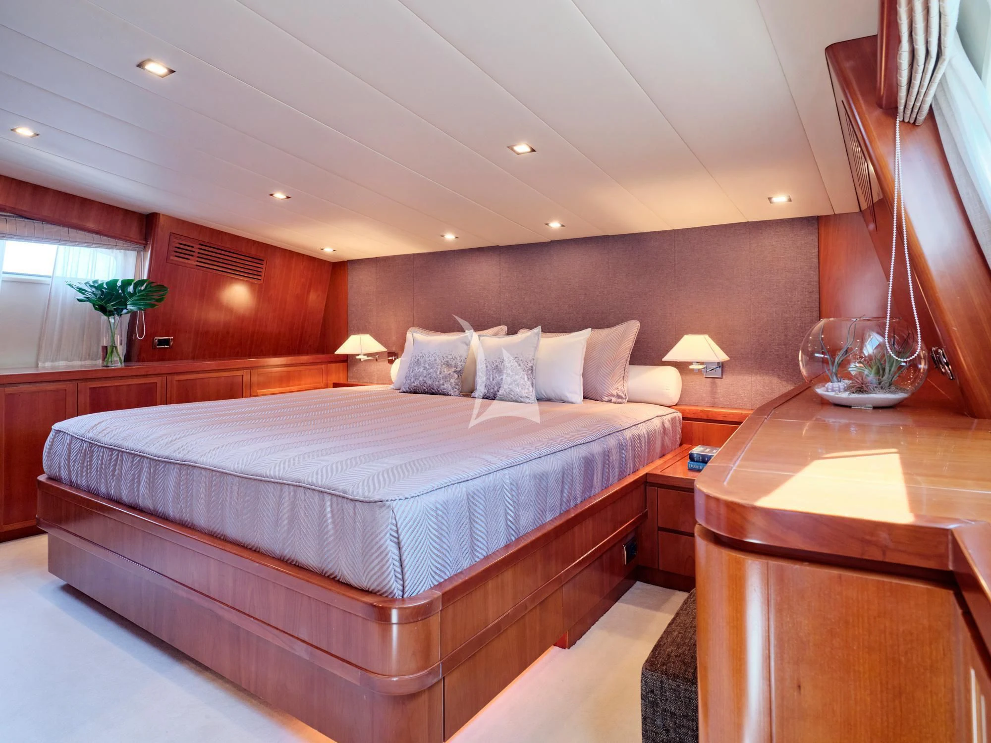 a bed in a hotel room aboard HELIOS Yacht for Charter