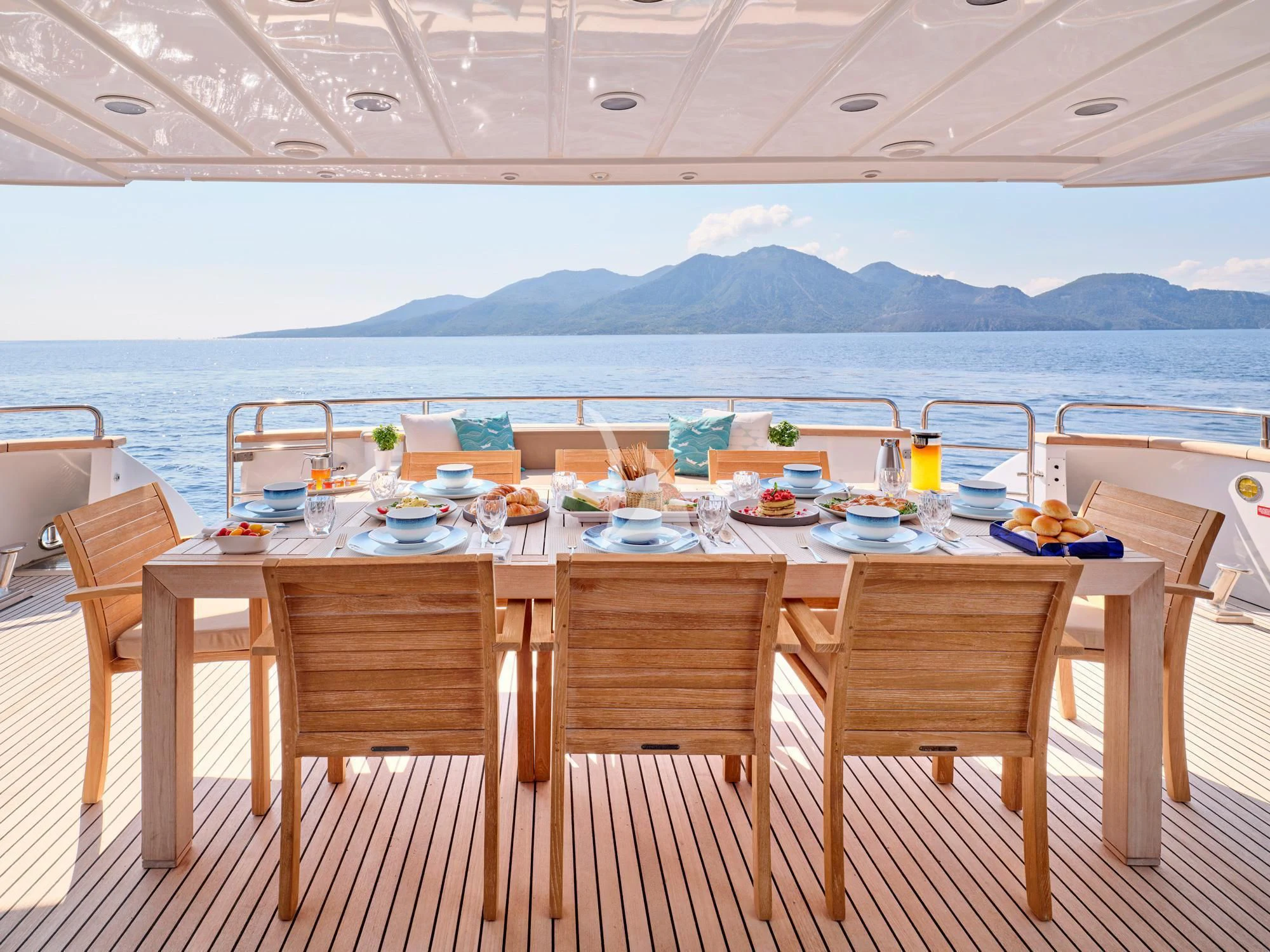 a table set for a meal aboard HELIOS Yacht for Charter