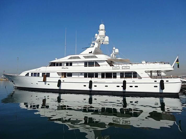 a white boat on water aboard MARIA Yacht for Sale