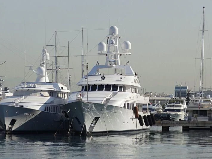 several boats in a harbor aboard MARIA Yacht for Sale
