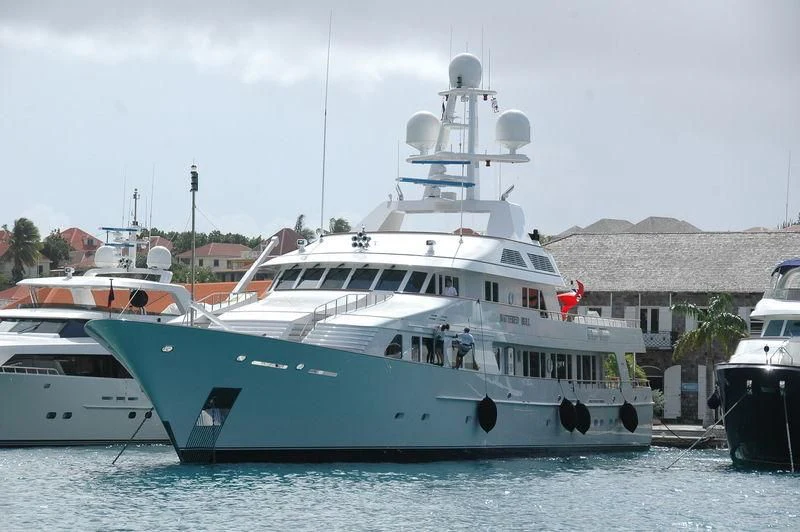 a large white boat in the water aboard MARIA Yacht for Sale