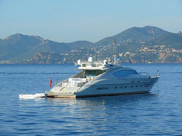 a white yacht in the water aboard ESCAPE Yacht for Sale
