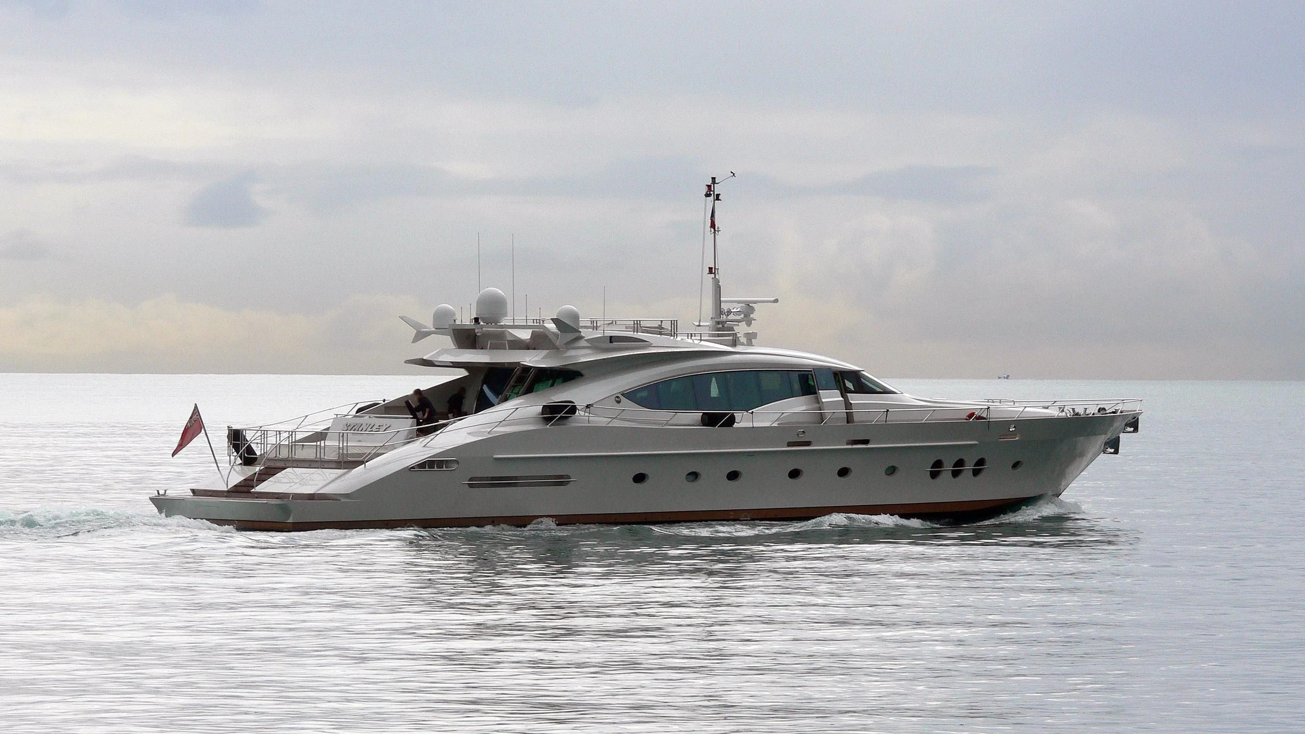 a white yacht in the water aboard ESCAPE Yacht for Sale