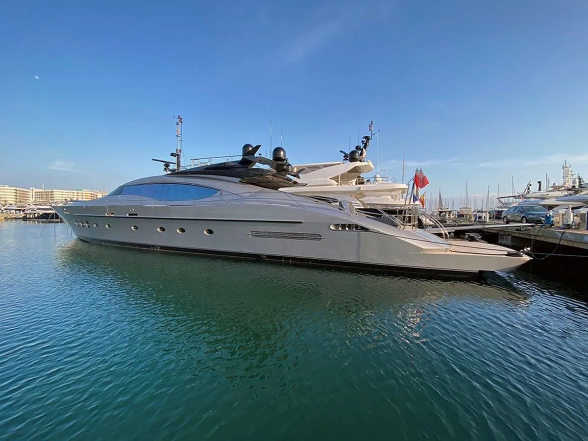 a large white boat docked aboard ESCAPE Yacht for Sale