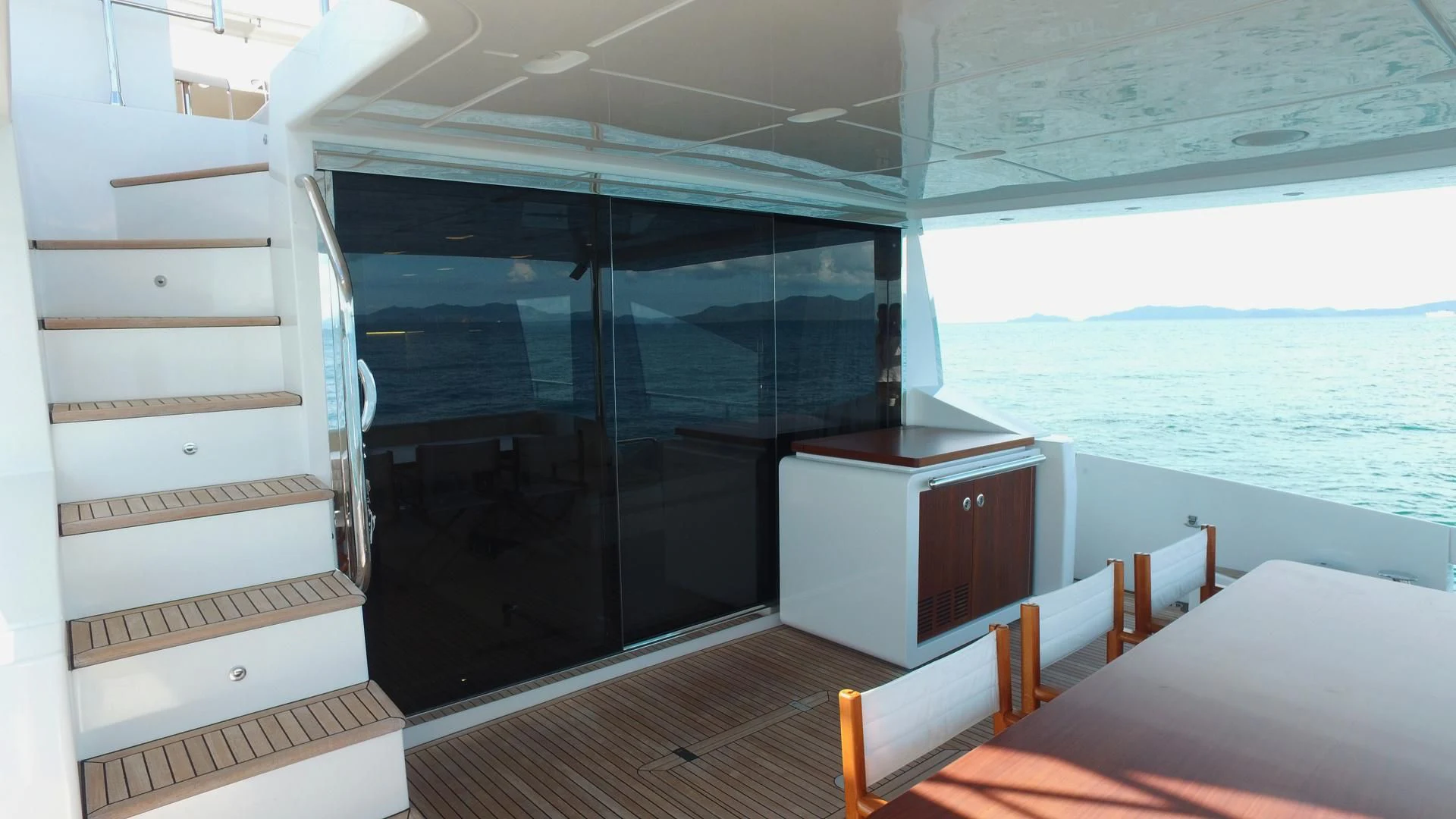 a room with a bed and a desk aboard SOLACE NT Yacht for Sale