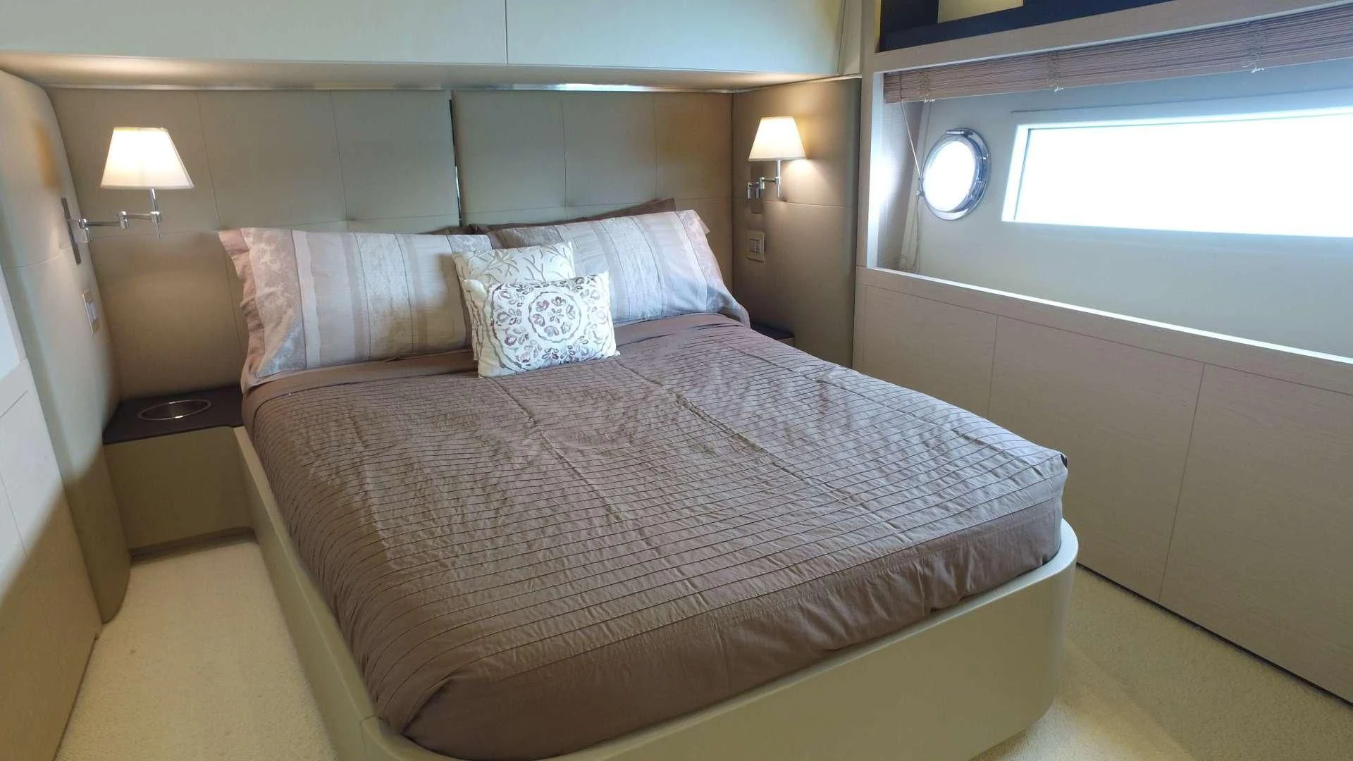 a bed with pillows aboard SOLACE NT Yacht for Sale