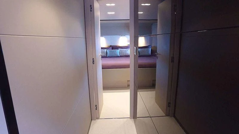 a hallway with doors aboard SOLACE NT Yacht for Sale